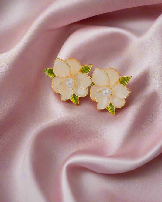 Floral hair clip on a woven headband with a plain background